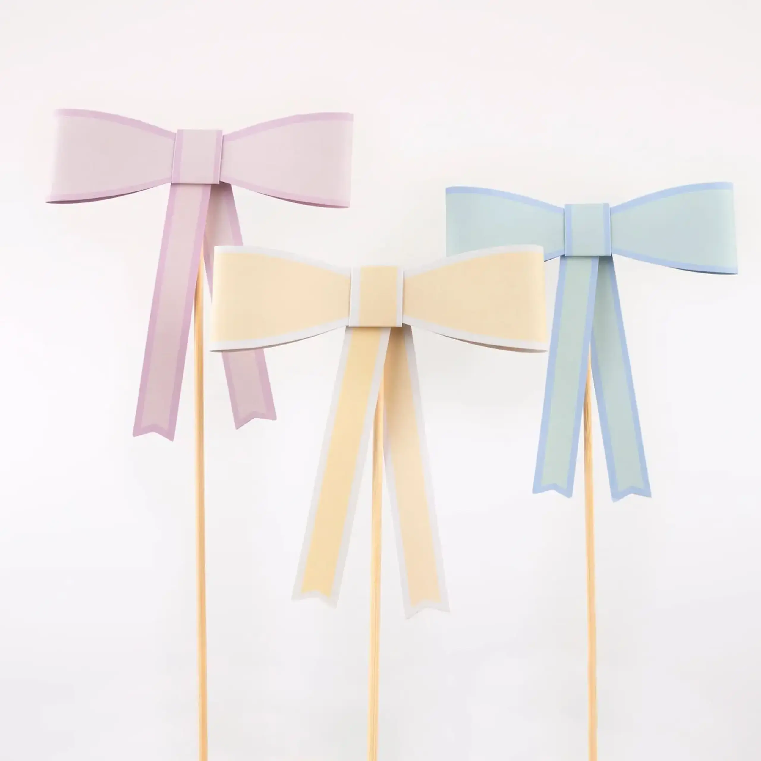 Set de toppere pentru tort cu fundițe pastel — Meri Meri