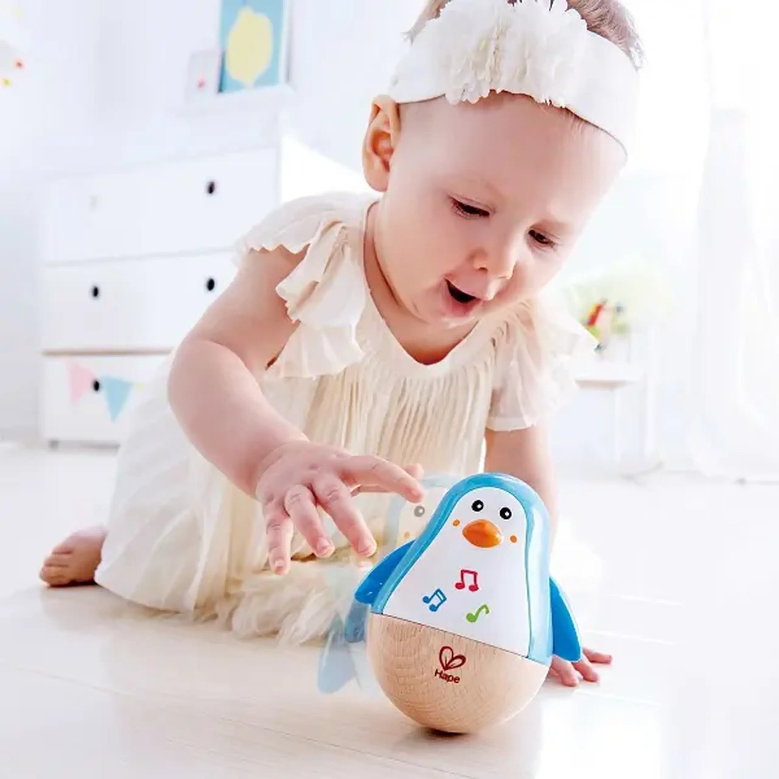 Jucărie muzicală "Pinguinul car nu cade"