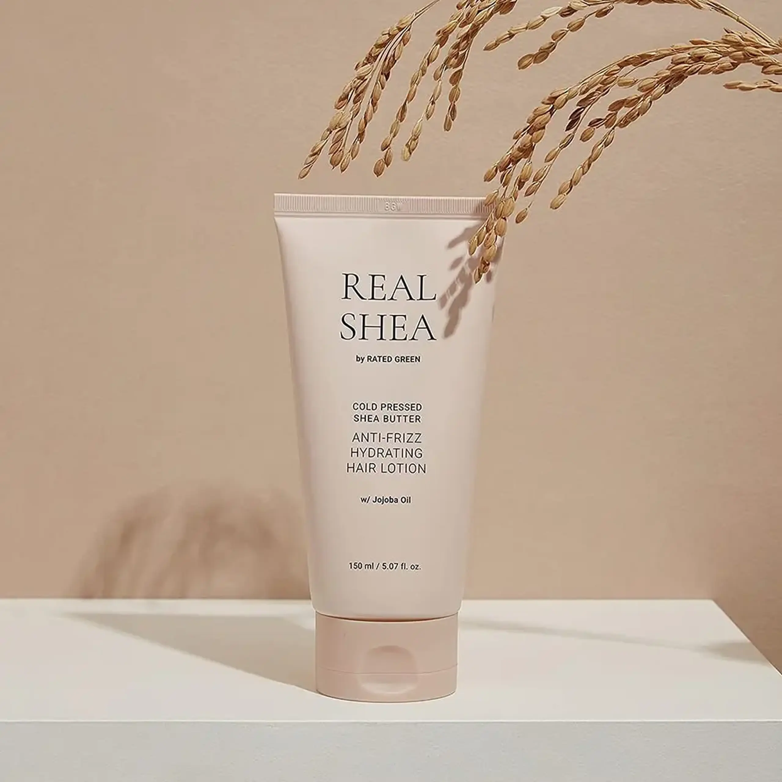 Loțiune împotriva firelor ne-ascultătoare Rated Green Cold Pressed Shea Butter Anti-Frizz Hair Lotion 150ml