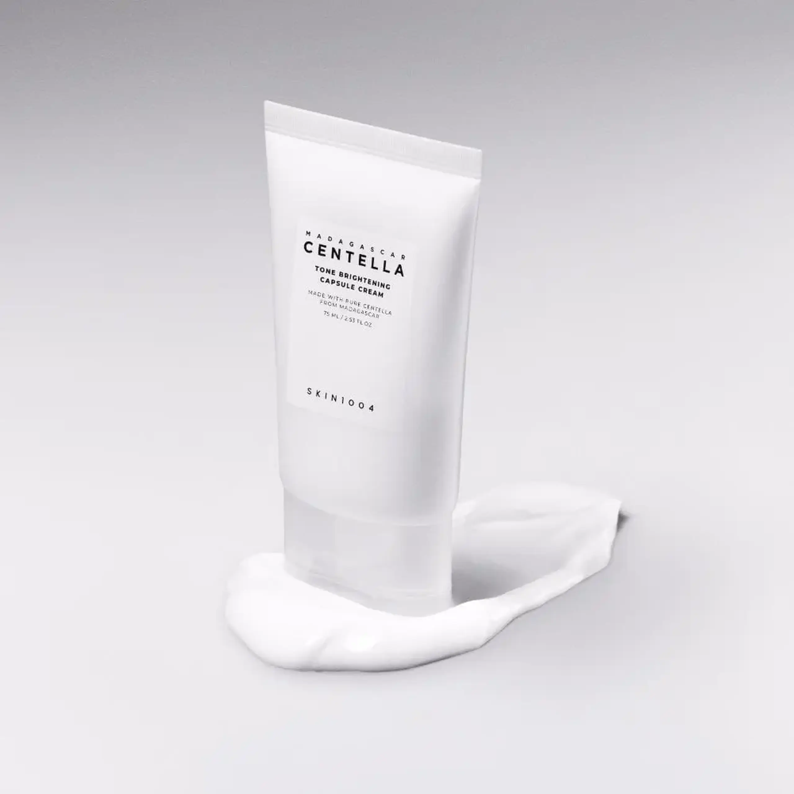 Cremă iluminantă pentru uniformizarea tenului cu acid tranexamic Skin1004 Madagascar centella tone brightening capsule cream 75 ml