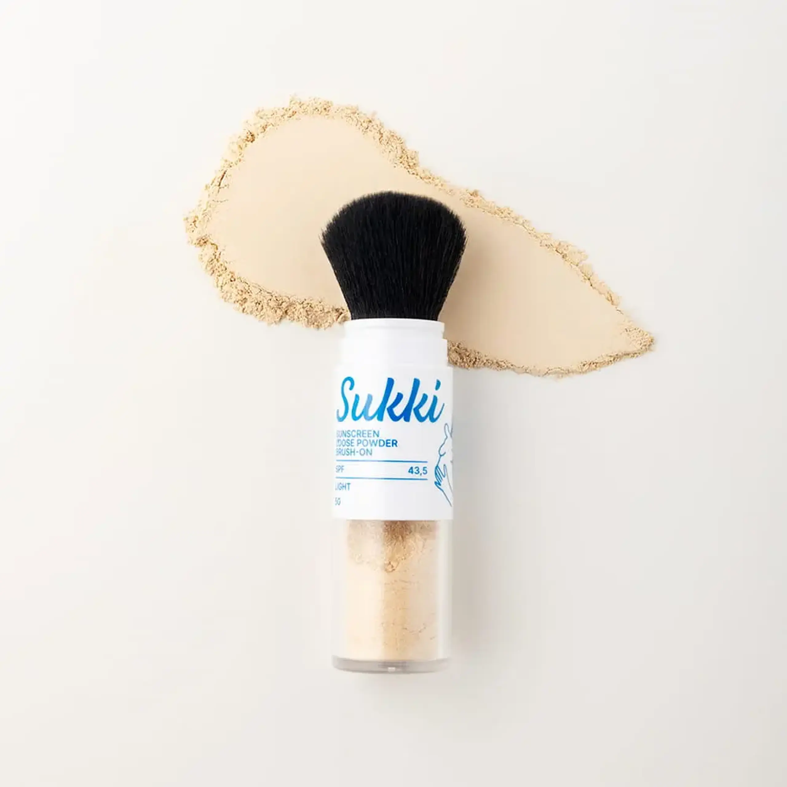 Pudră cu protecție solară cu pensulă Sukki Sunscreen Loose Powder Brush-On SPF 43.5 5g