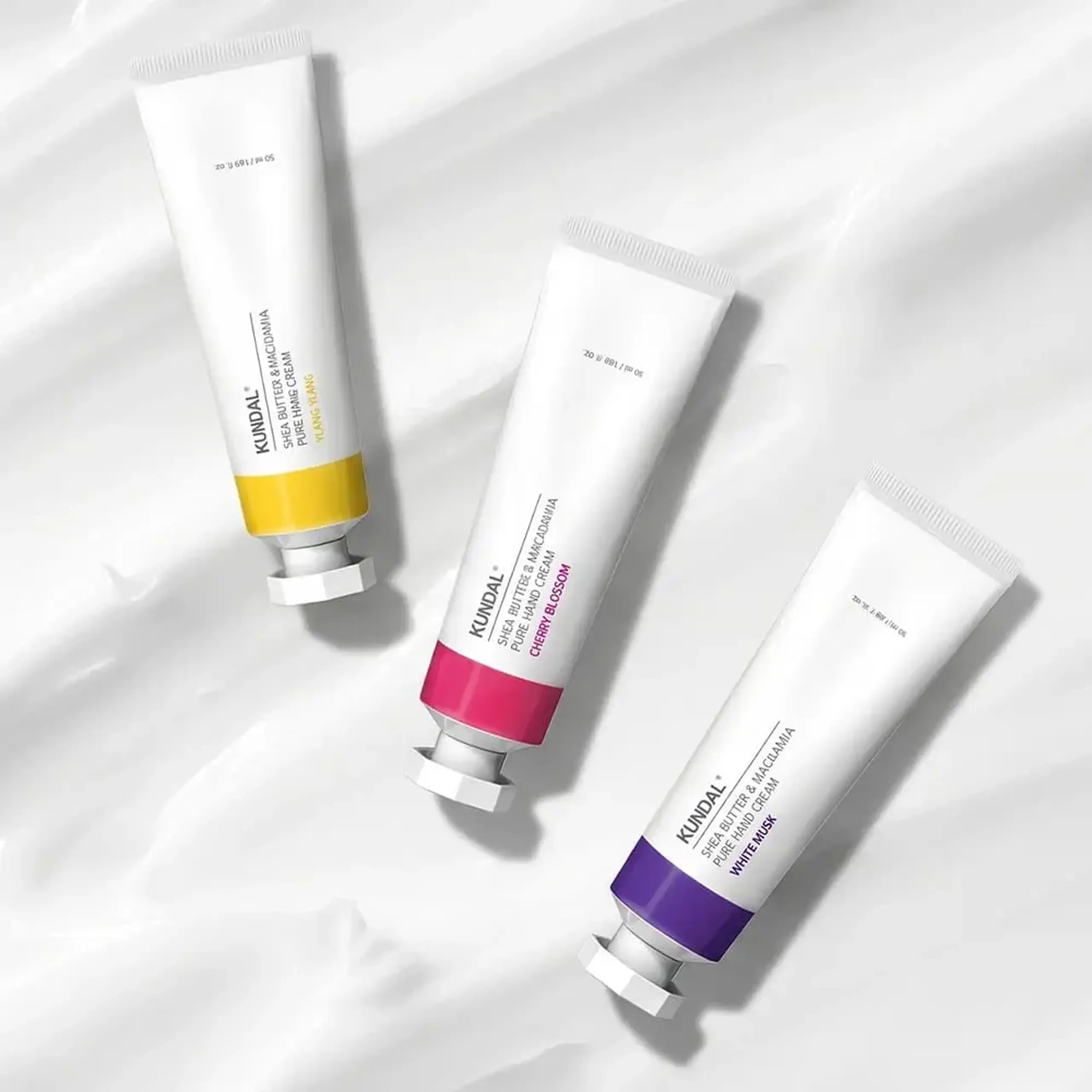 Set creme pentru mâini KUNDAL Signature Perfumed Hand Cream Trio – White Musk, Cherry Blossom &amp; Ylang Ylang