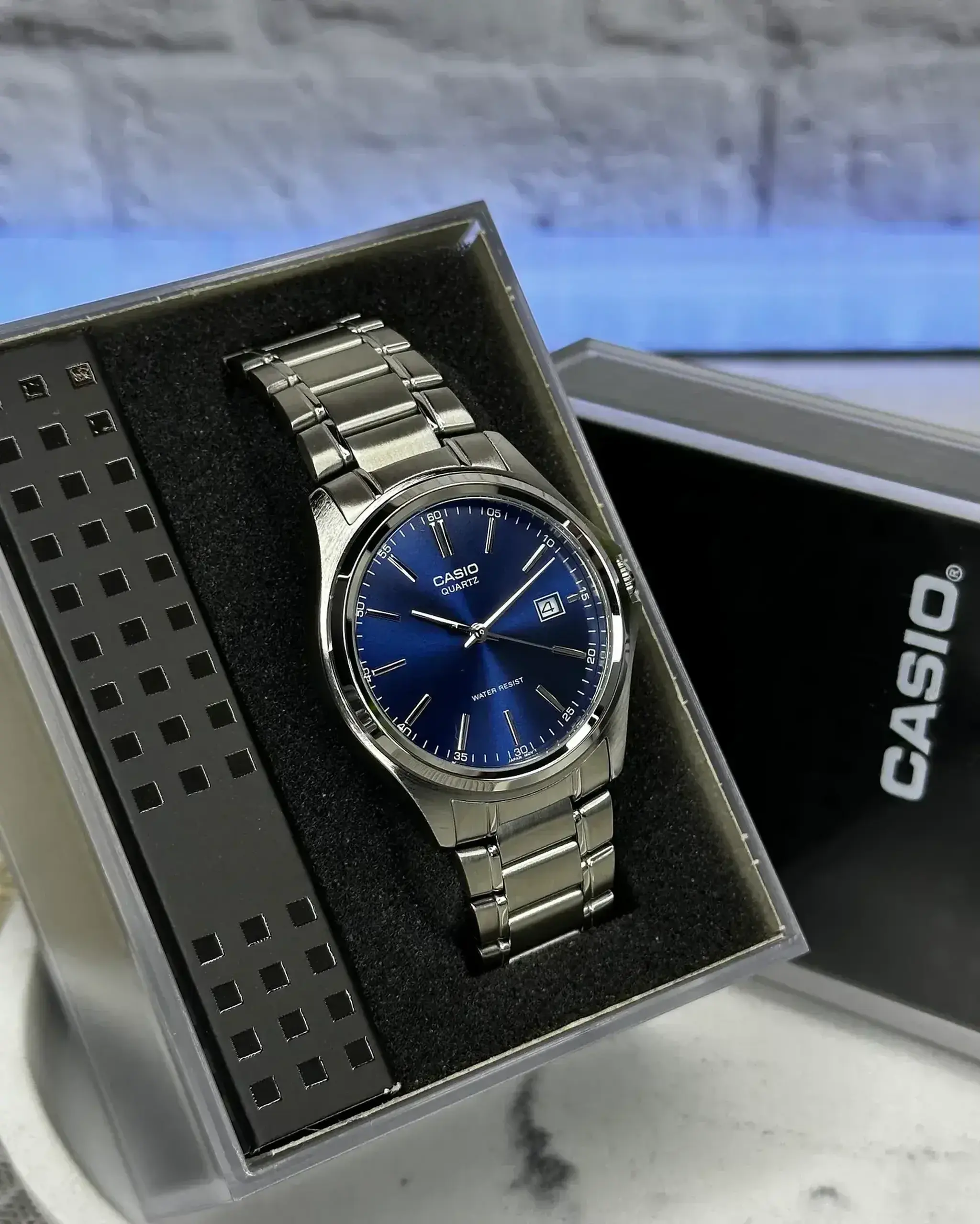 Casio MTP-1215A-7ADF - Albastru 42 × 38.5 × 8.7 mm